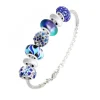 Bracelet de charms perles bleus et acier SC Crystal