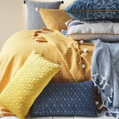 Coussin à pompons en polycoton 40x40cm DIVALI