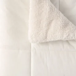 Couvre lit matelassé double face velours/sherpa BIEN CHEZ SOI