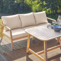 Salon de jardin 7 places CARNOTA DINING en bois d'acacia. table rectangulaire. coussins gris