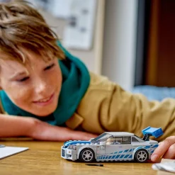 Speed Champion 76917 Nissan Skyline GT-R 2 Fast 2 Furious, Kit de Construction, Maquette de Voiture de Course, avec Minifigurine Brian O'Conner